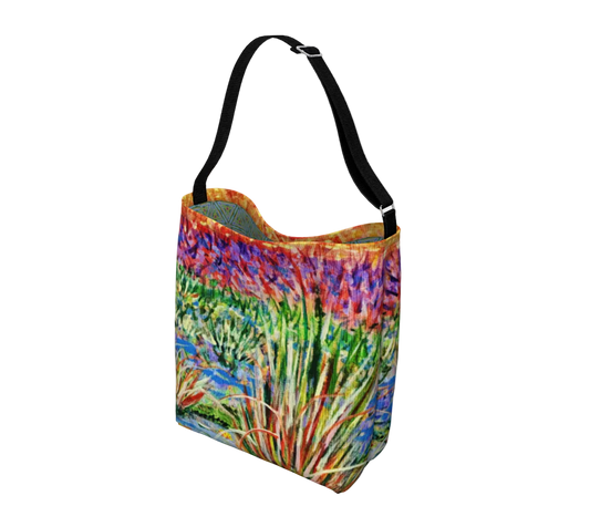 Tote bag with a colorful floral design on a white background