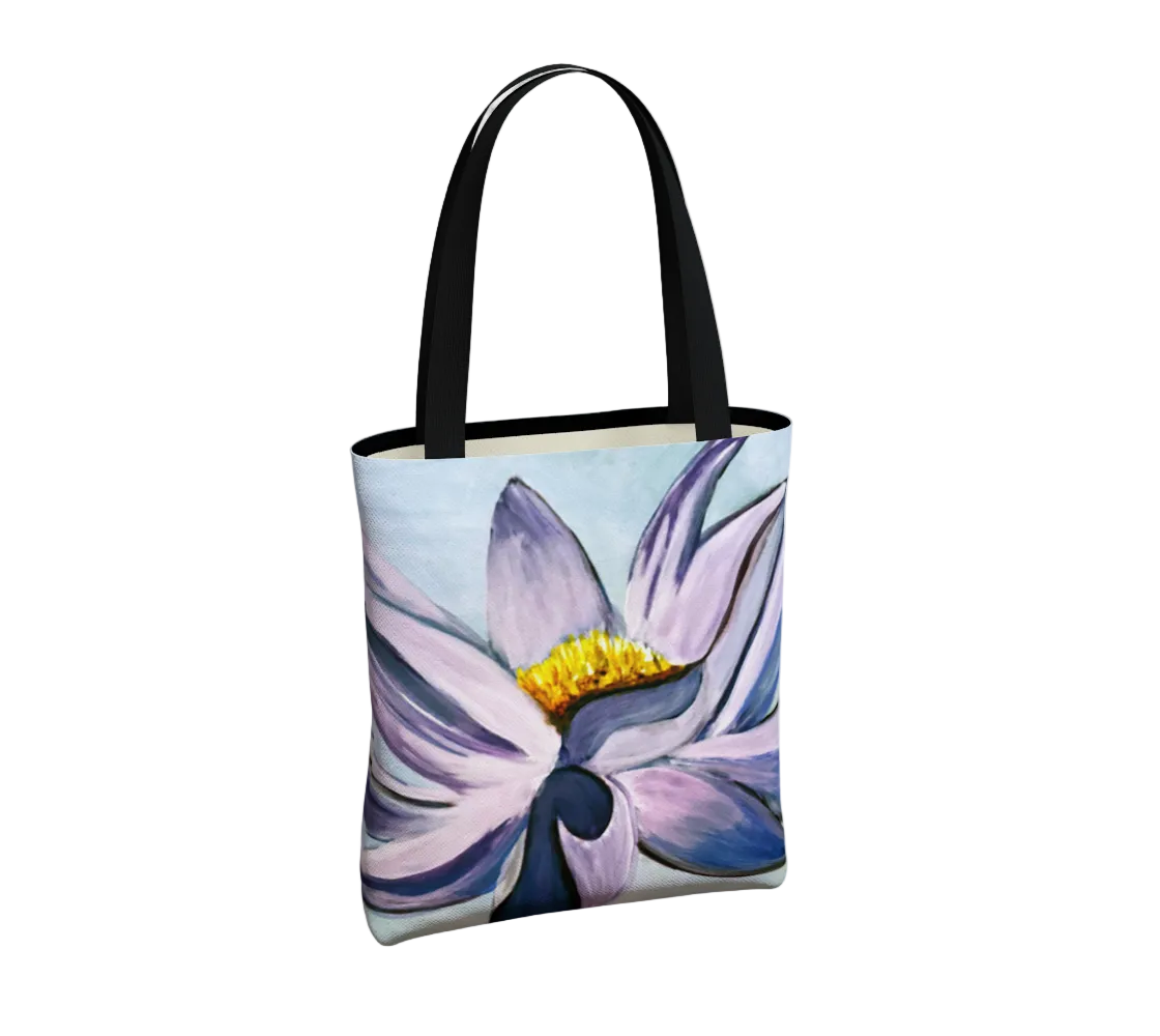 Tote bag with a floral design on a light gray background