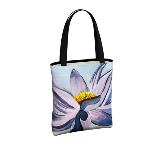Tote bag with a floral design on a light gray background