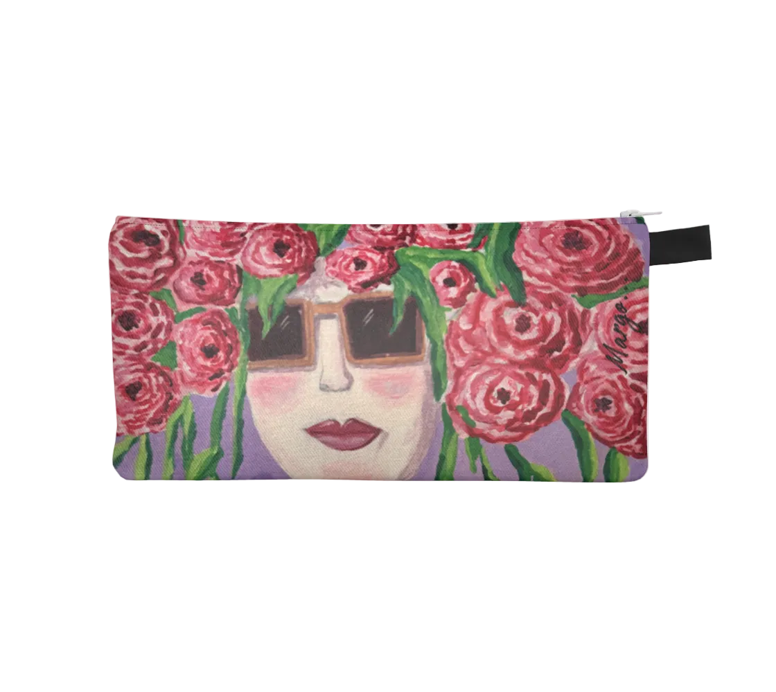 Pouch with a design of a face surrounded by pink flowers on a light purple background