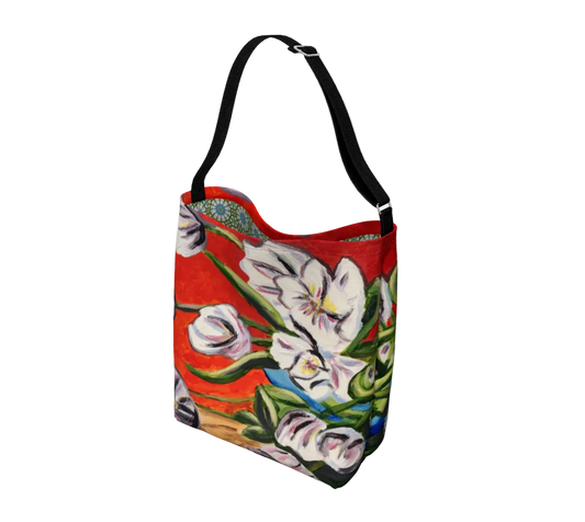 Floral-patterned bag with a red background on a light gray background