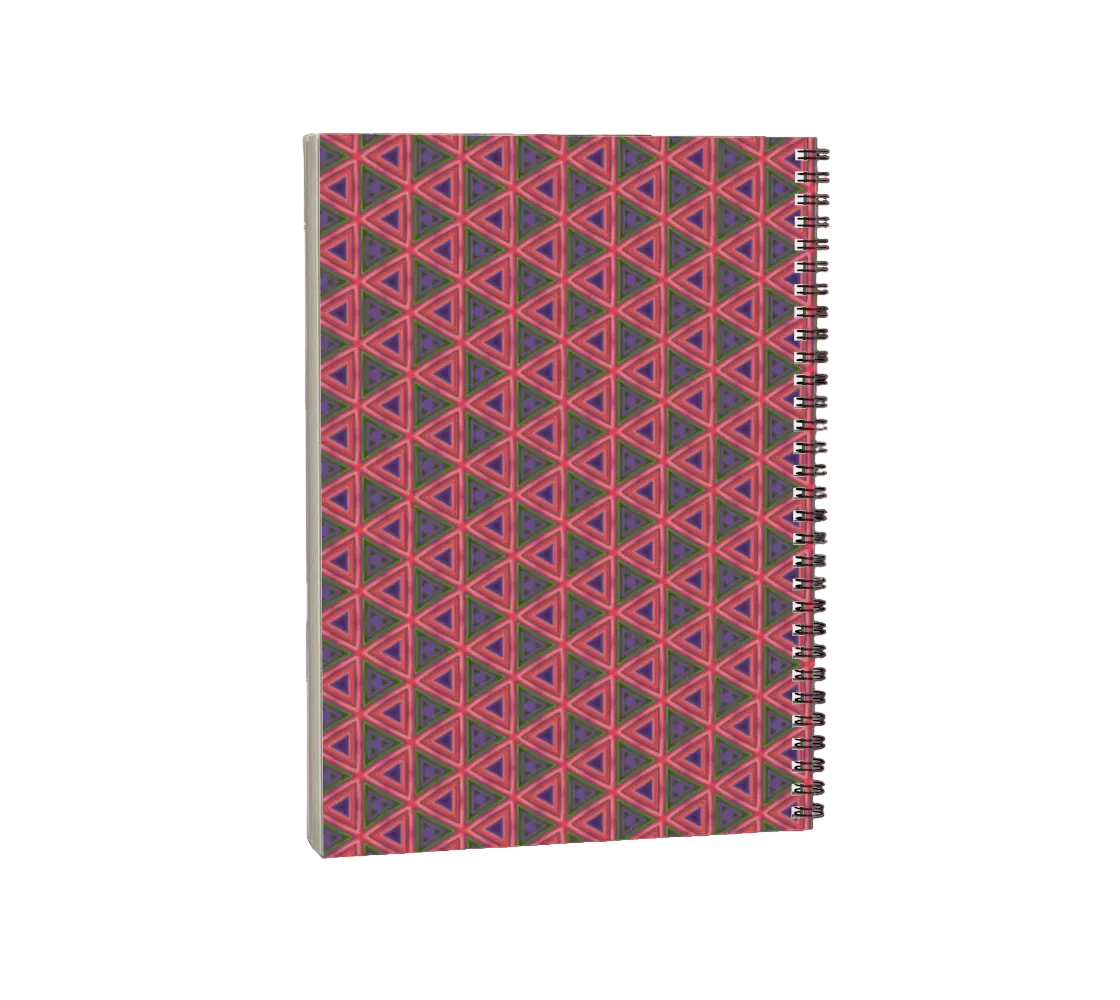 Notebook with geometric red and purple pattern on a white background