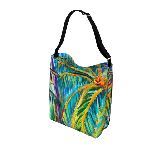 Colorful tote bag with leaf pattern on a light gray background
