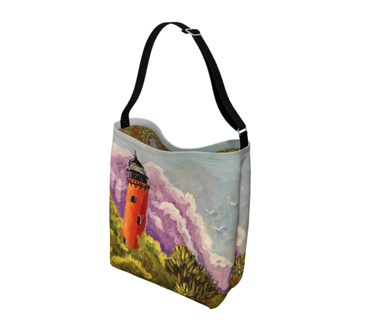 Tote bag with a lighthouse design on a white background