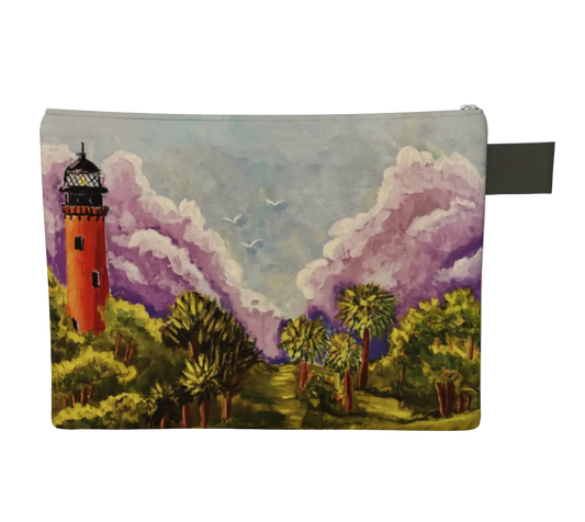 Pouch with a lighthouse and nature design on a white background