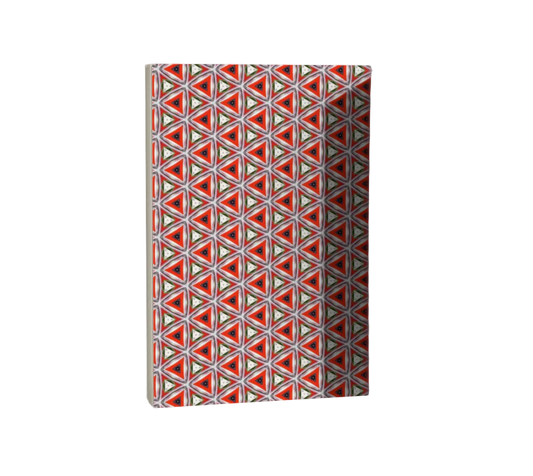 Notebook with geometric triangle pattern on a white background