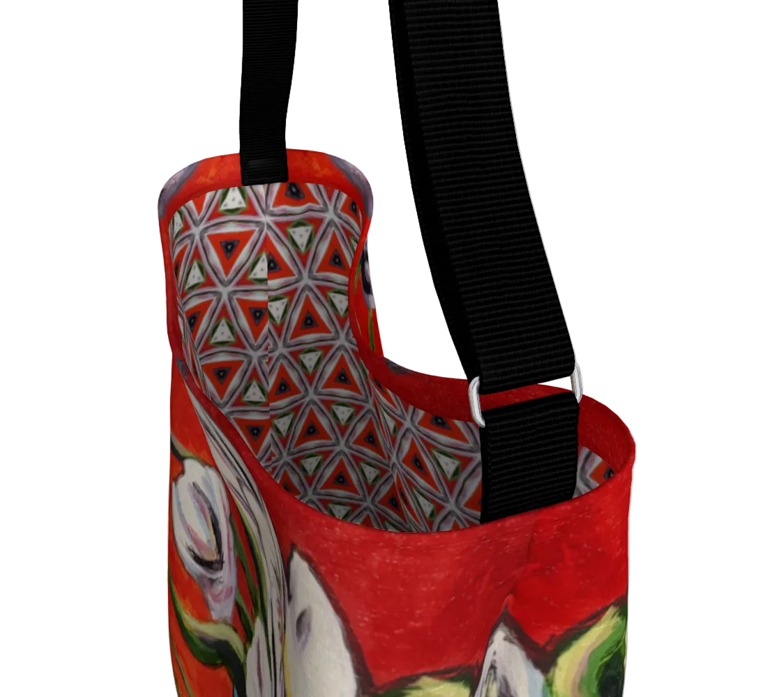 Red bag with geometric pattern and animal illustration on a white background
