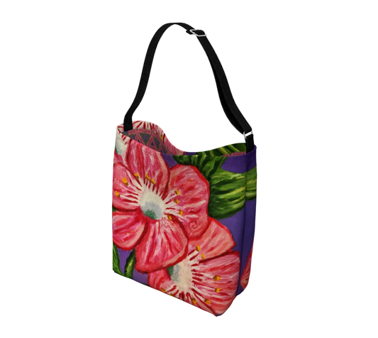 Floral-patterned bag with a strap on a light gray background